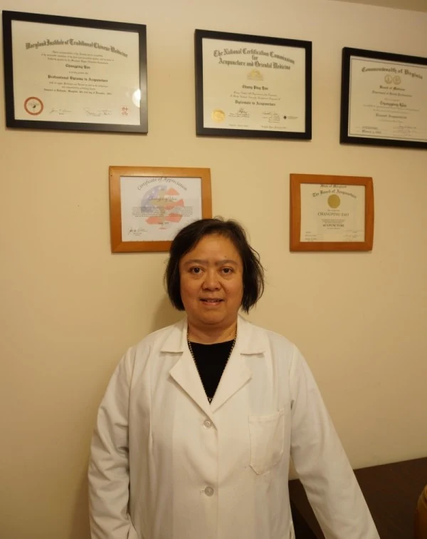 Changping Yao, CMD, L.Ac., at her acupuncture clinic